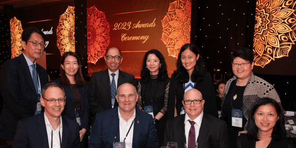 Attendees pose at the PIC awards ceremony dinner.